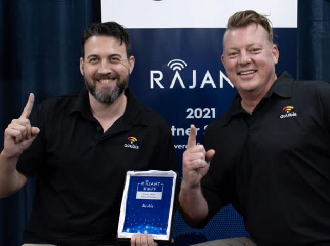 Chris Acton and Jeff Berg accepting the Rajant award