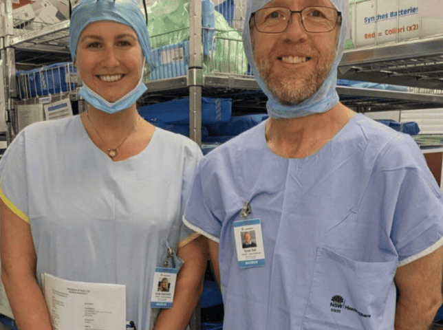 Sarah and Simon dressed in hospital scrubs